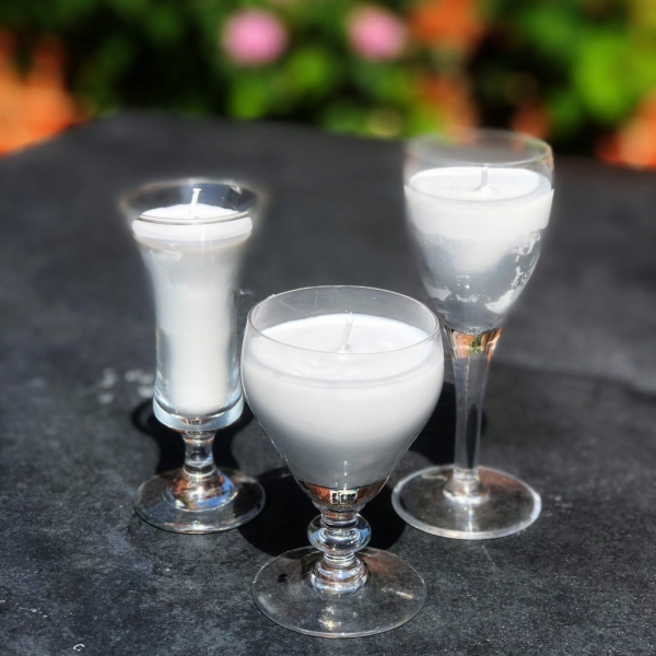 Pure white candles in vintage sherry glasses at Henley Circle Online Shop