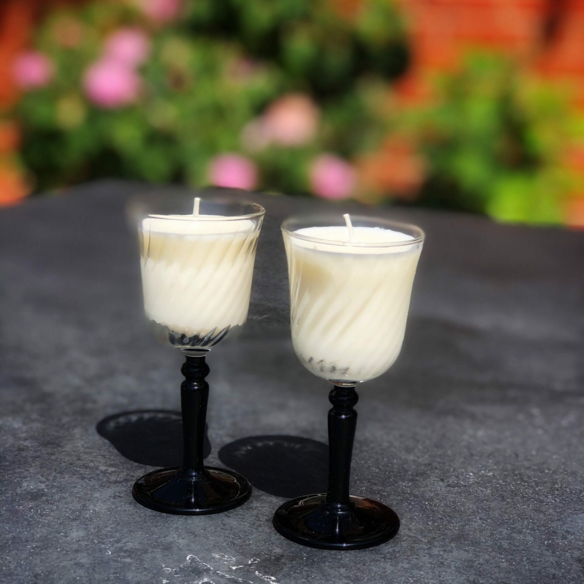 Pure white candles in vintage sherry glasses at Henley Circle Online Shop
